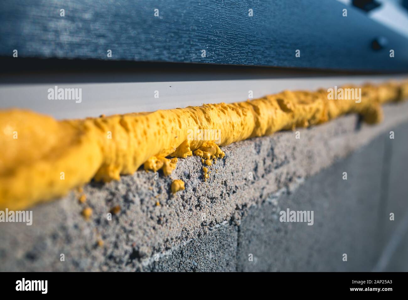 DIY concept. Construction PU poly urethane foam. The window is