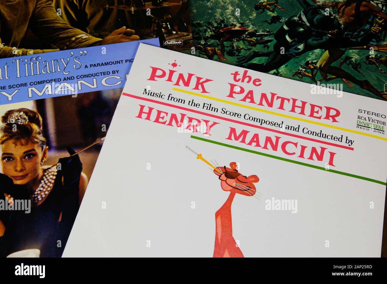 Viersen, Germany - 3. January 2020: Close up of old movie soundtrack vinyl record album covers with focus Henry Mancini Pink Panther Stock Photo