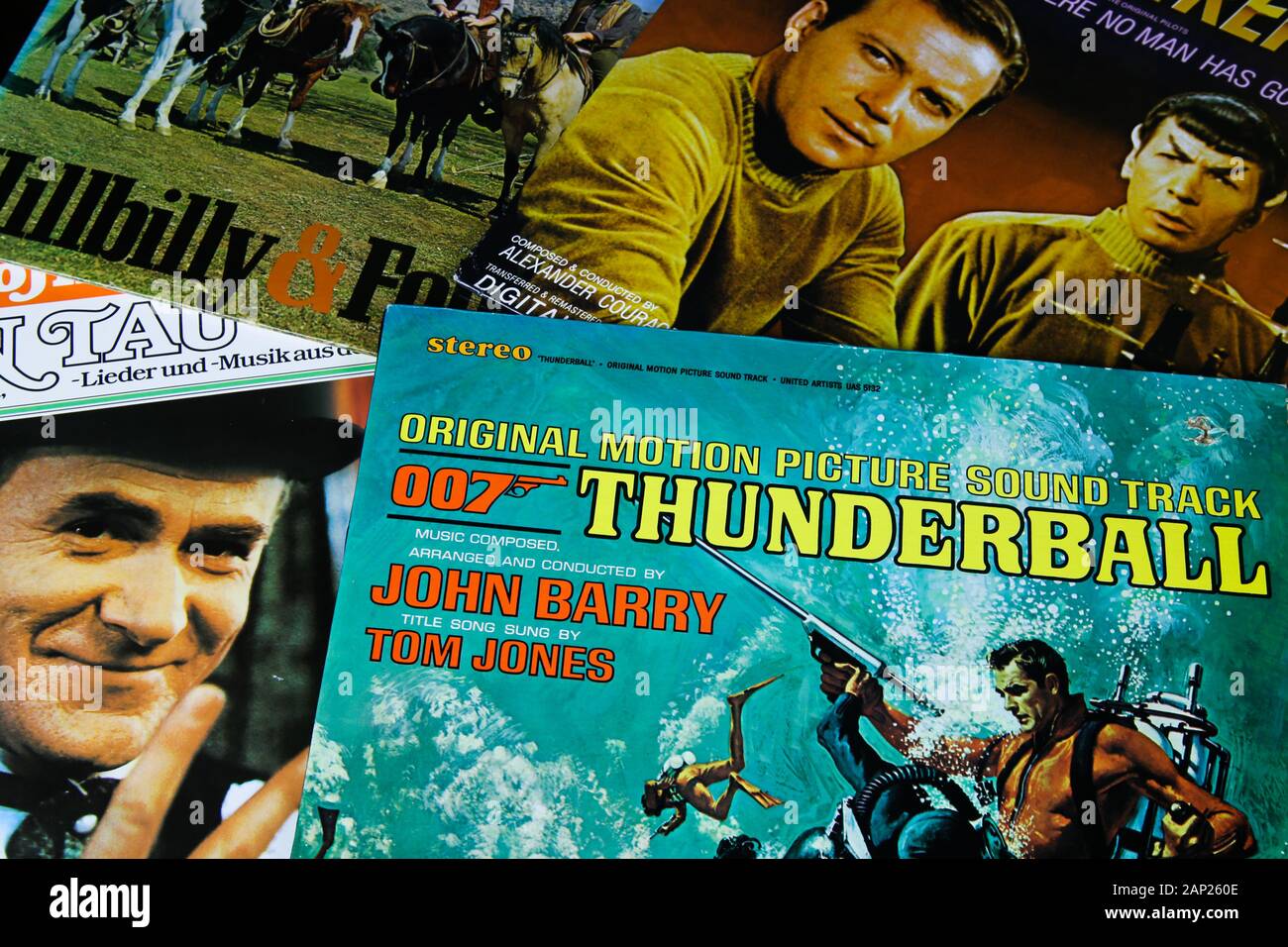 Viersen, Germany - 3. January 2020: Close up of old movie soundtrack vinyl record album covers with focus on James Bond 007 Thunderball Stock Photo
