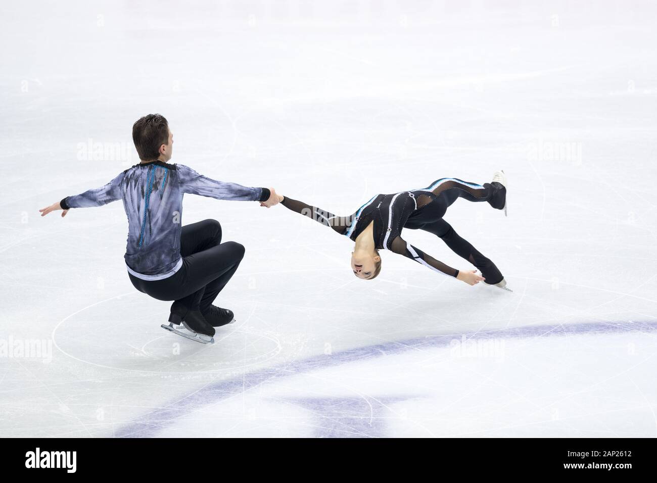 Daria Pavliuchenko and Denis Khodykin of Russia compete during senior pairs free skating at Palavela ice rink in Turin, Italy on December 6, 2019 Stock Photo