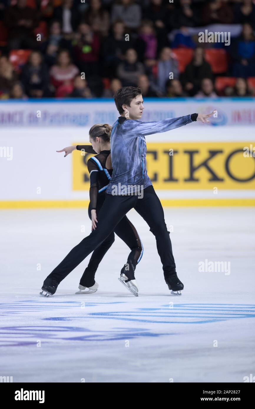 Daria Pavliuchenko and Denis Khodykin from Russia compete in the pairs free skating during day 2 of the ISU Grand Prix of Figure Skating - Internation Stock Photo