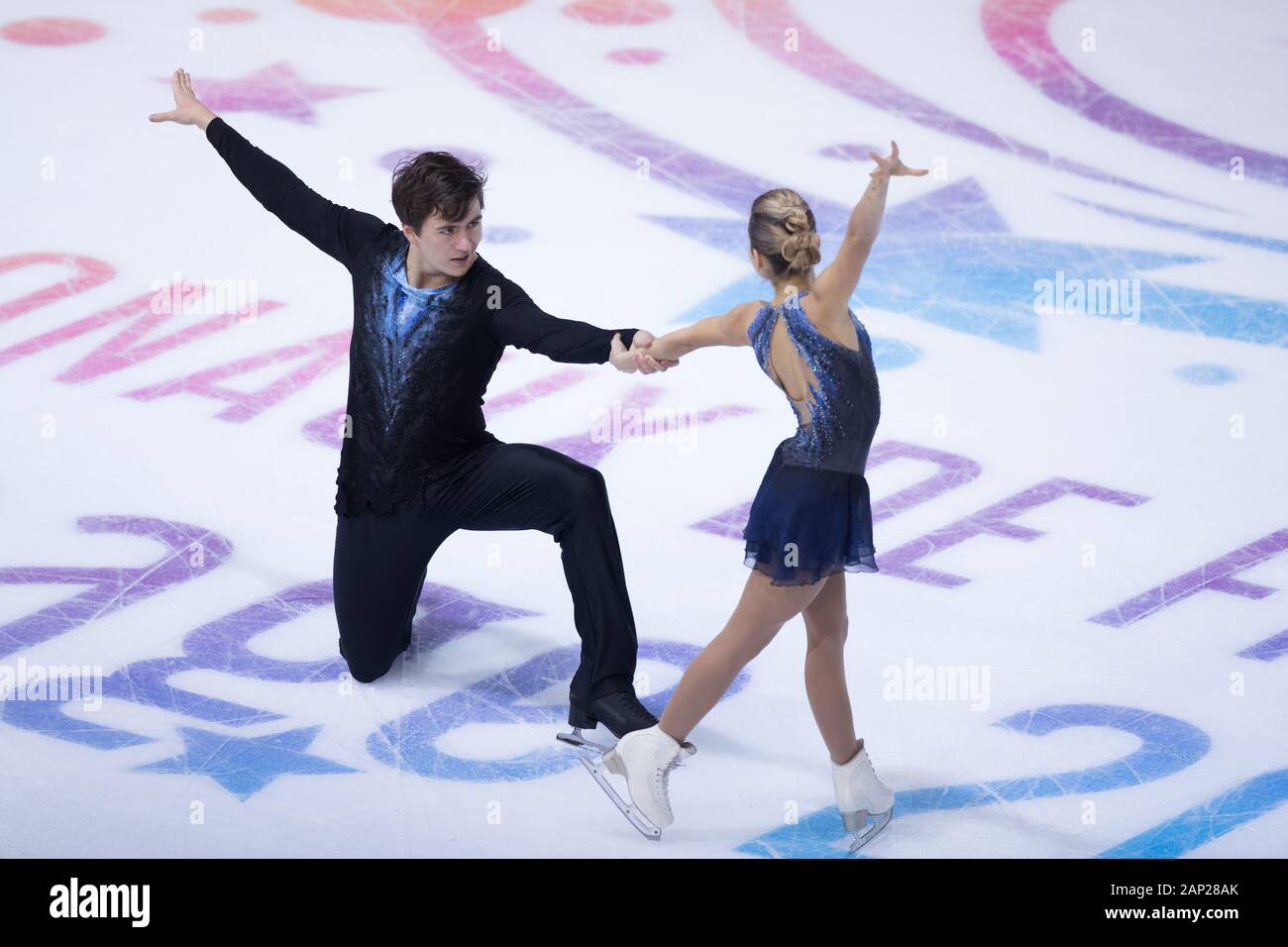 Daria Pavliuchenko and Denis Khodykin from Russia compete in the pairs short program during day 1 of the ISU Grand Prix of Figure Skating - Internatio Stock Photo