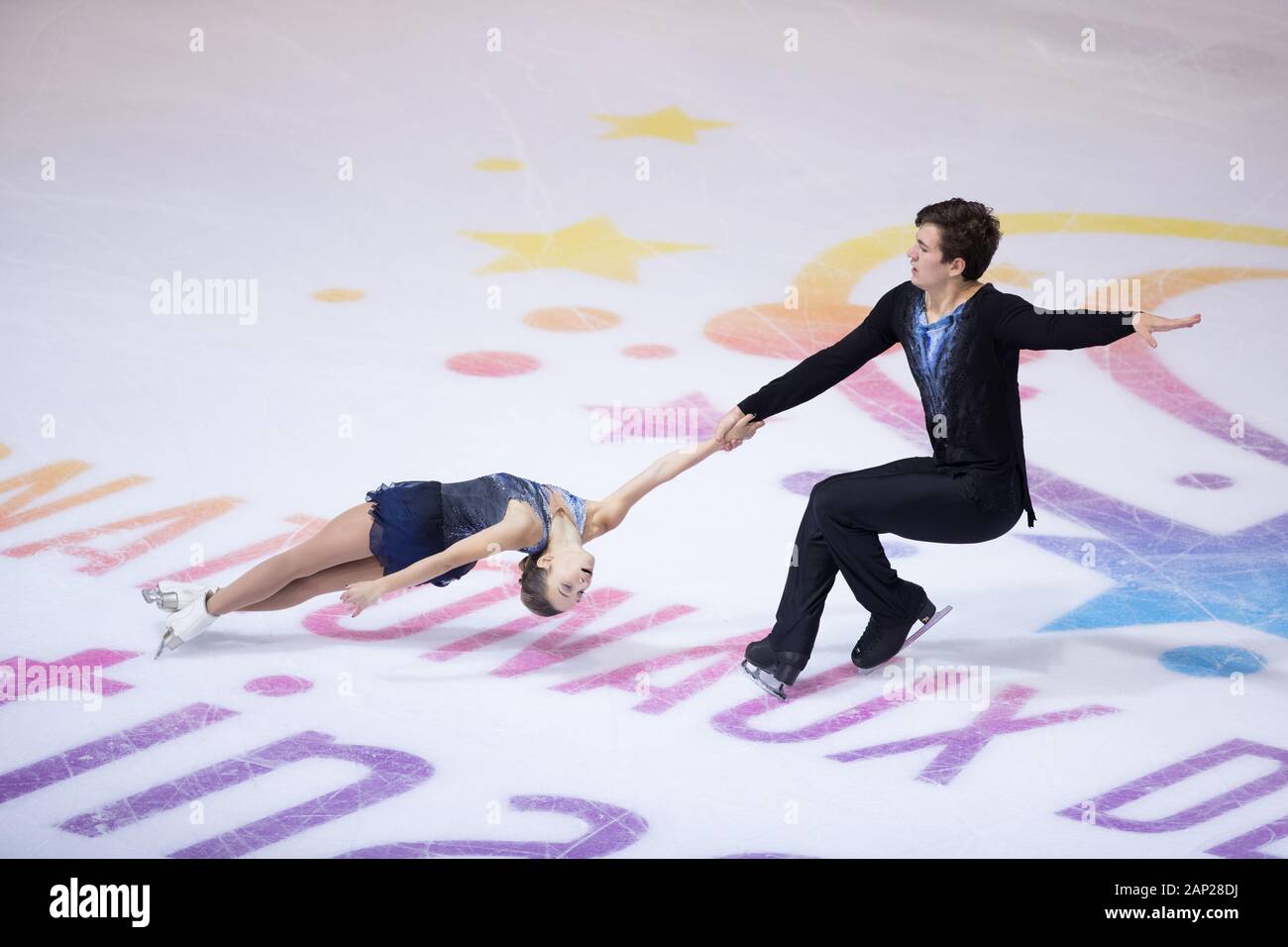 Daria Pavliuchenko and Denis Khodykin from Russia compete in the pairs short program during day 1 of the ISU Grand Prix of Figure Skating - Internatio Stock Photo