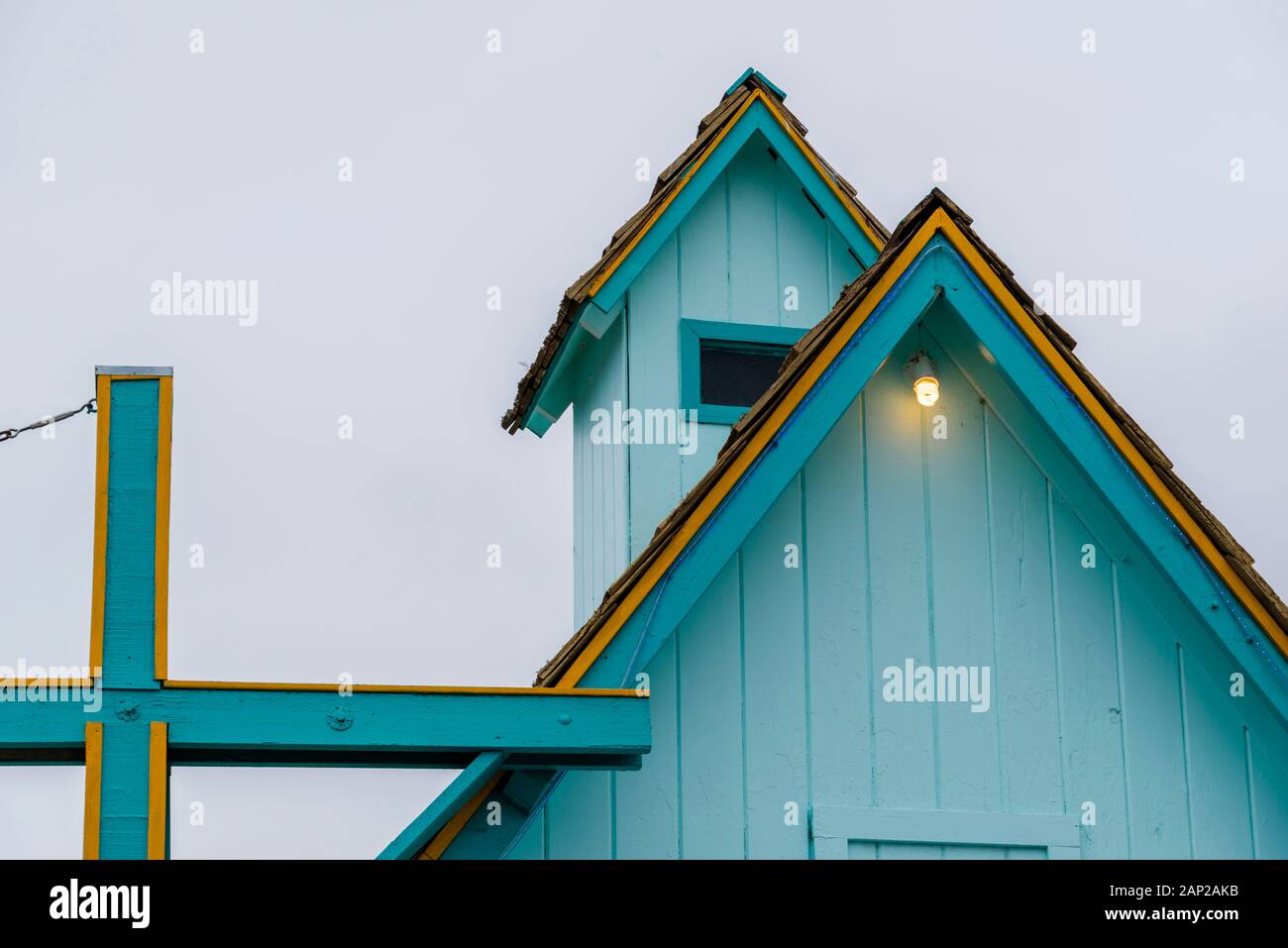 Detail of a colourful roofline, at a bakery in downtown Moss Landing