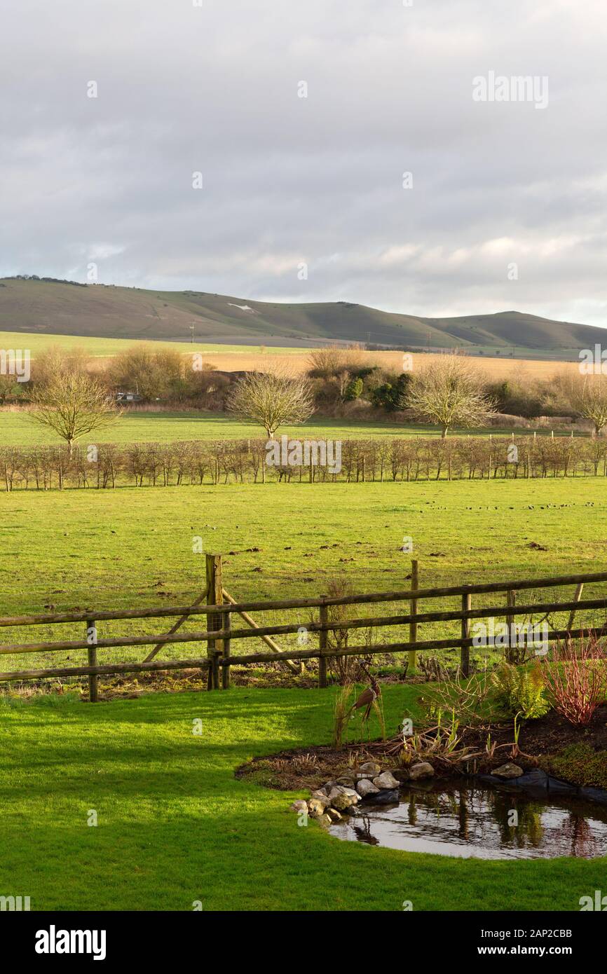 Wiltshire countryside - landscape looking across Pewsey Vale towards the Pewsey White horse, Pewsey, Wiltshire England UK Stock Photo