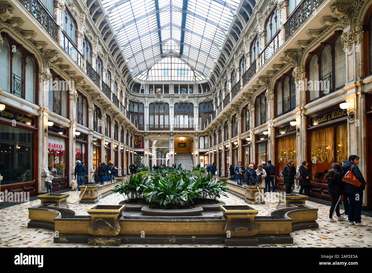 View of the historic Galleria Subalpina shopping gallery in the city centre of Turin, with shops, cinema and cafè, Piedmont, Italy Stock Photo