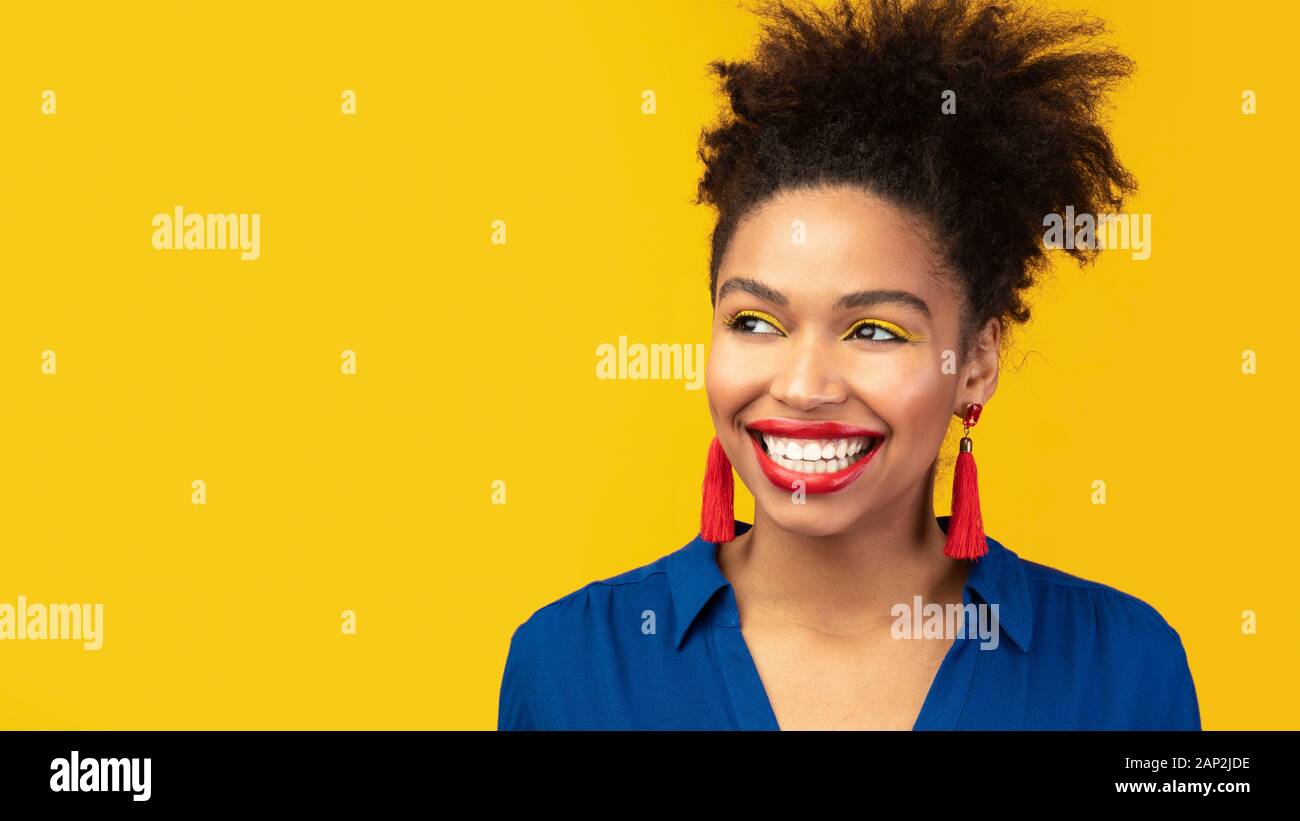 Close up portrait of laughing afro woman Stock Photo