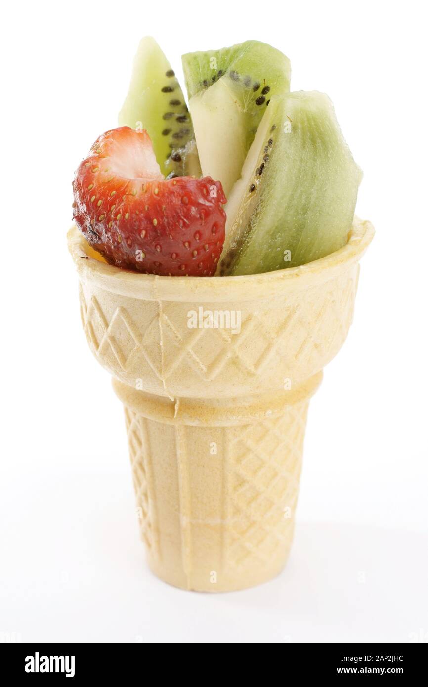 Small snack of fruit in an ice cream cone cup, isolated on white Stock Photo Alamy