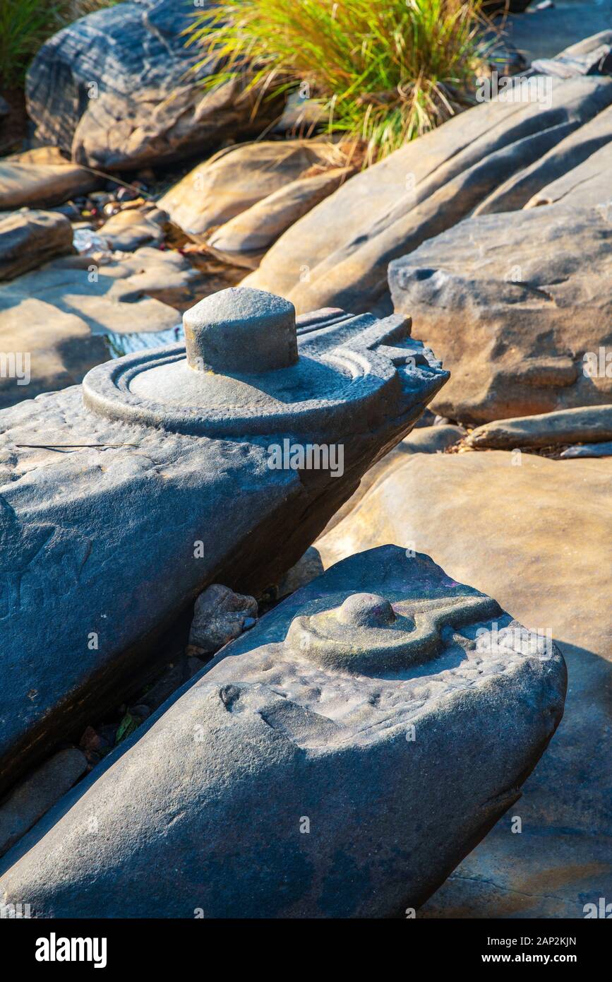 Sahasralinga - place is known for thousand lingas are carved on the rocks in the river Shalmala. Lingam(symbol ogf God Shiva +  yoni (symbol og goddes Stock Photo