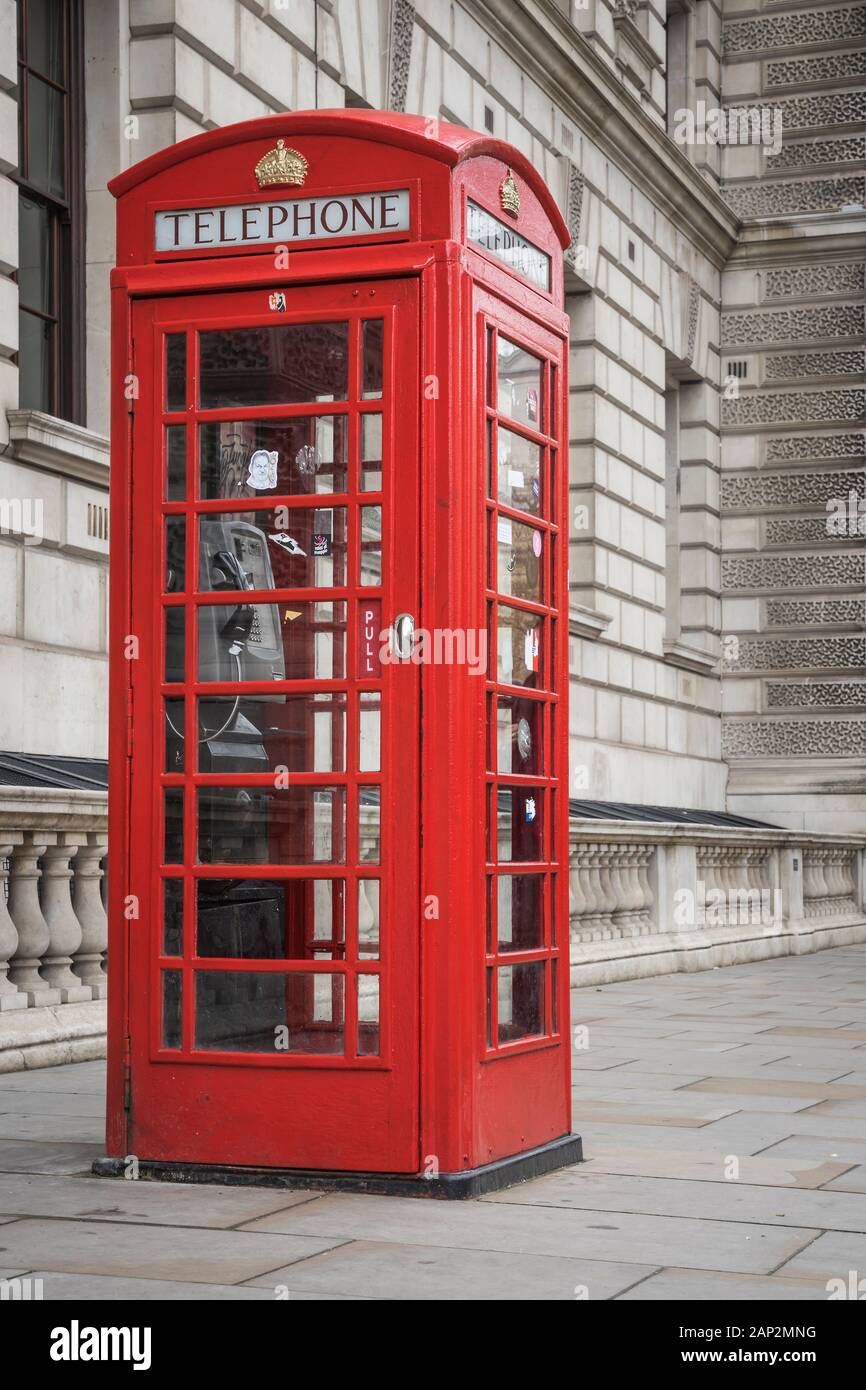 Retro red phone box in london with big ben hi-res stock