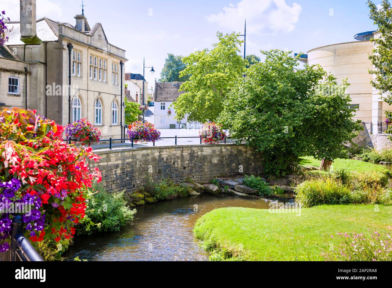 The shallow River Marden flows slowly through the town centre of Calne