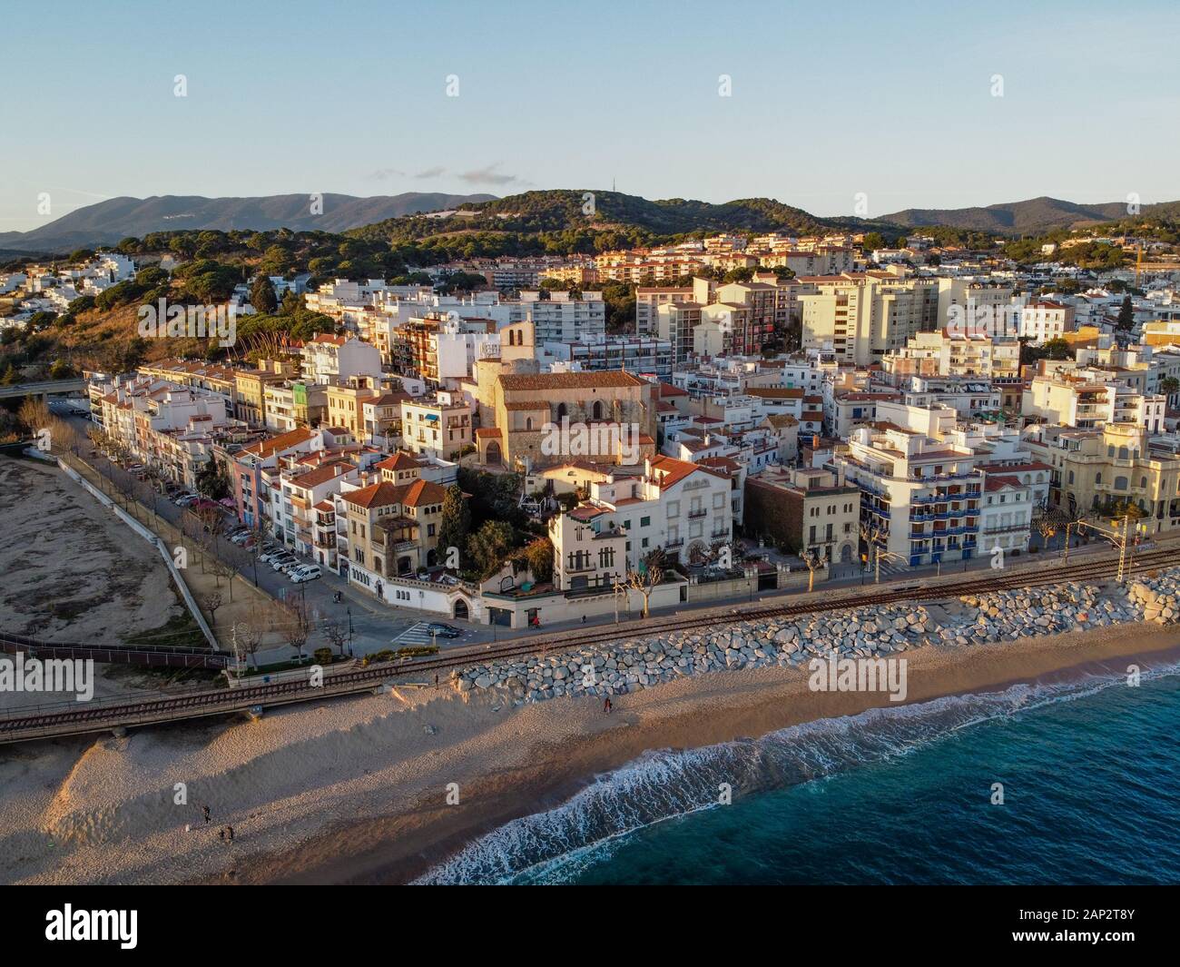 Aerial view of Sant Pol de Mar village and its church Ermita de Sant ...
