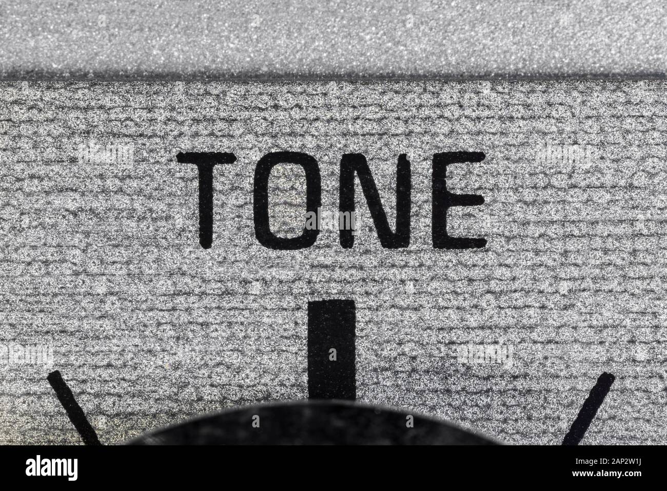 Close up macro photograph of tone dial on vintage boombox stereo. Stock Photo