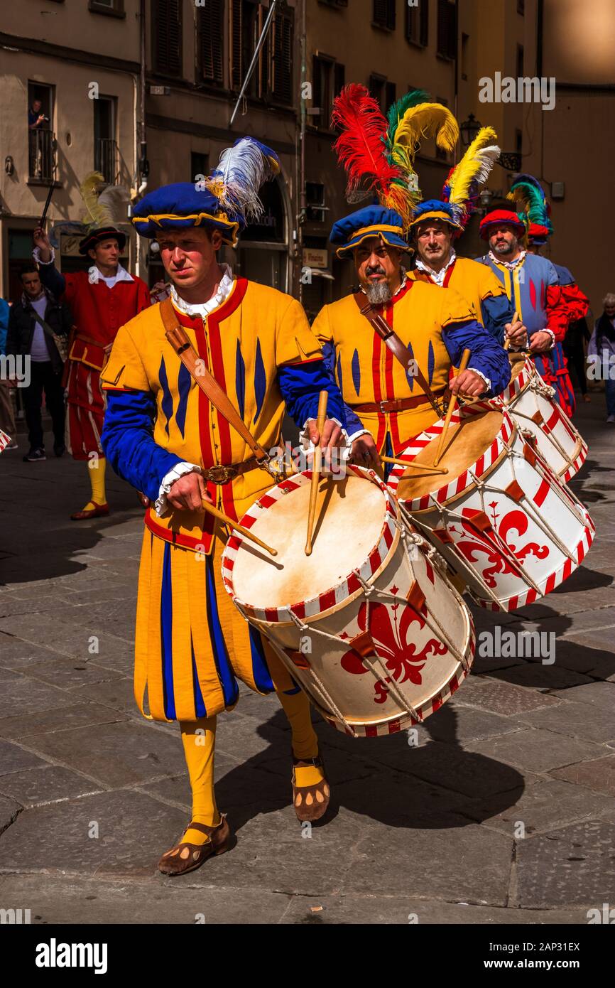 Italian men walk in a historical parade dressed in traditional clothes in Plazza della Signoria  Florence, Italy Stock Photo