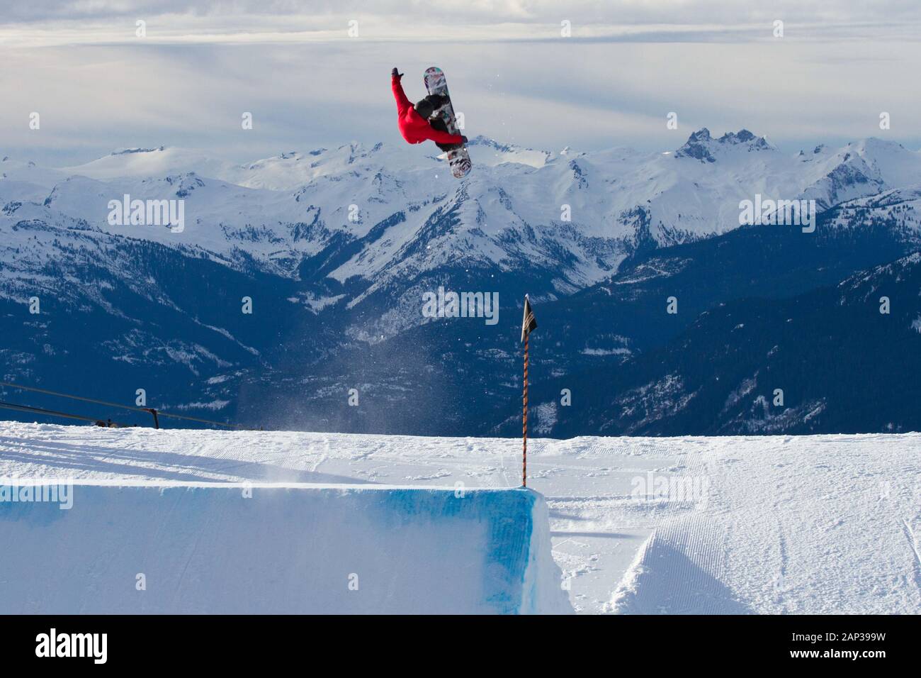 Snowboarder Hits Park Jump at Whistler Stock Photo