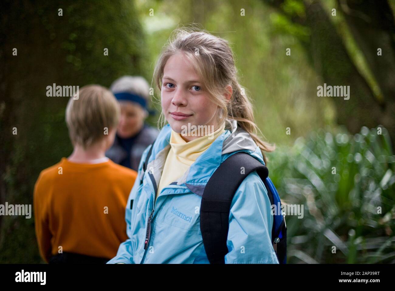 Girl hiking with family Stock Photo