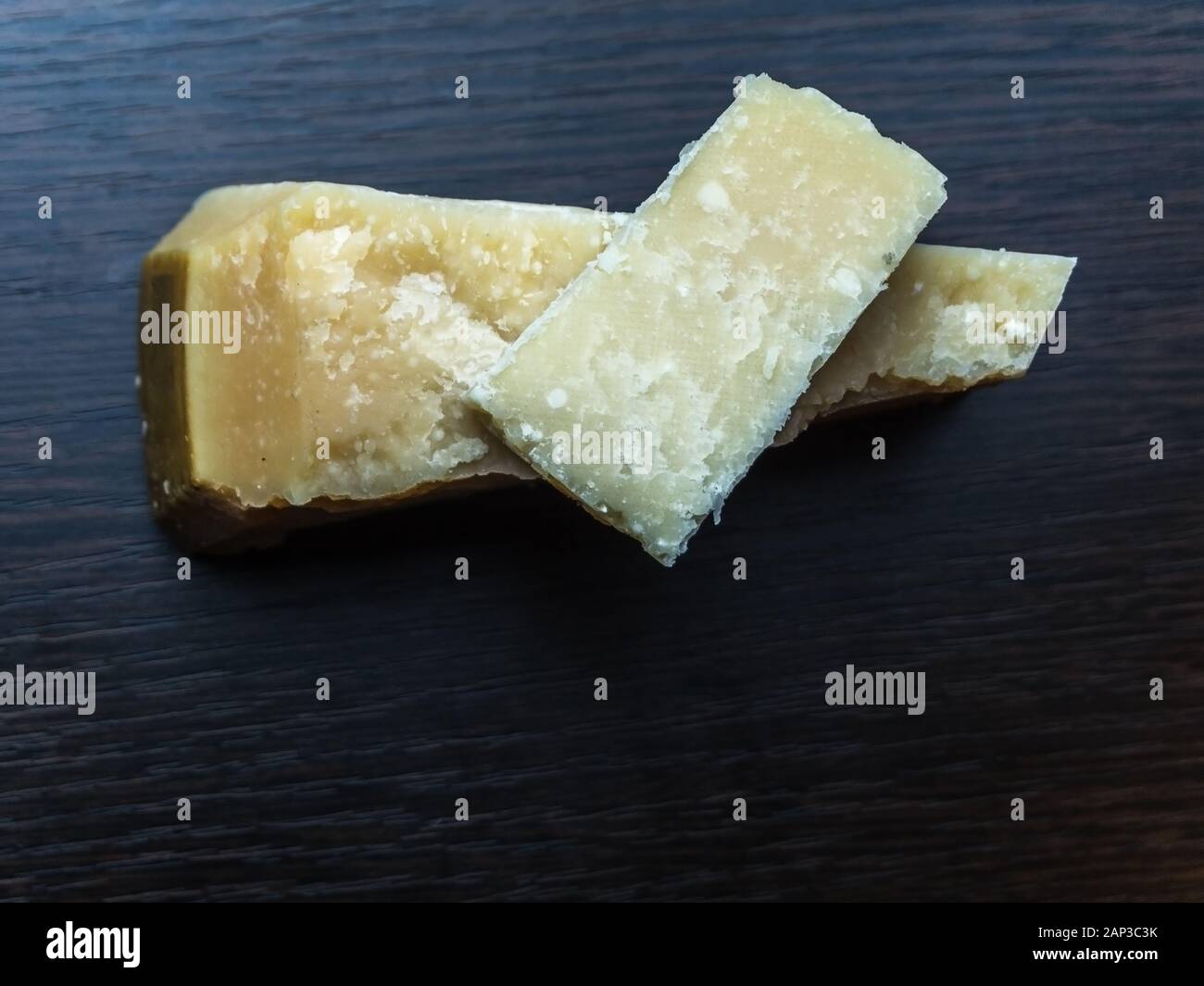 Italian parmesan cheese wood background Stock Photo Alamy