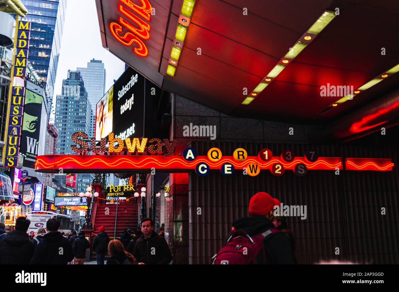 Time Square 42nd Street and 7th Avenue Subway Entrance with a busy crowd of people - New York, NY Stock Photo