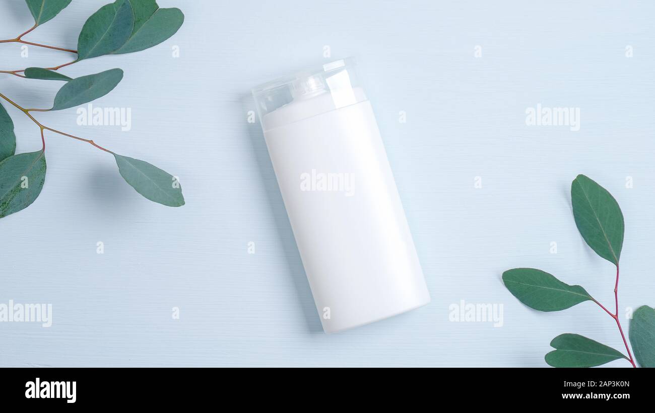 Download Cosmetics Spa Branding Mockup Clear White Bottle Container For Shampoo Shower Gel Hair Lotion And Eucalyptus Leaves On Blue Background Natural Org Stock Photo Alamy