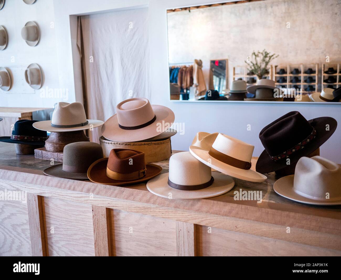 Retail counter hat display in various colors, shapes, and styles Stock  Photo - Alamy