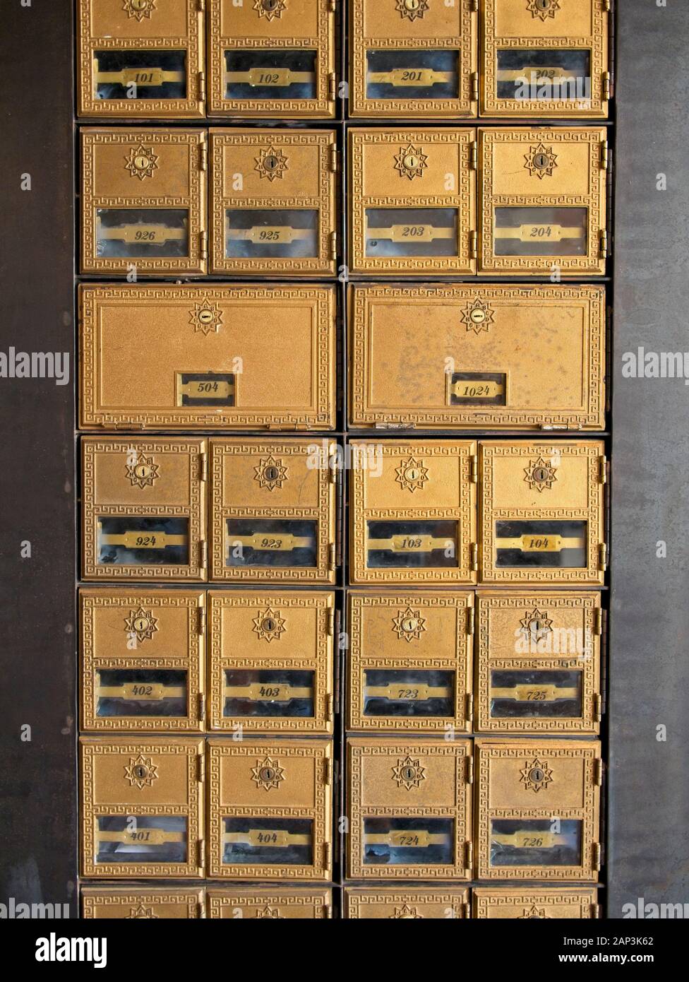 Historic post office mail boxes decorate downtown building lobby Stock