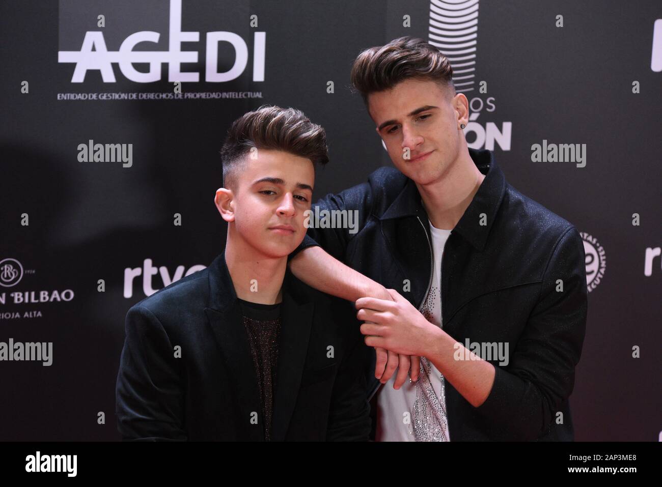 Adexe (L) and Nau attend a photocall prior to the Odeon Music Awards gala  at the Royal Theater in Madrid Stock Photo - Alamy