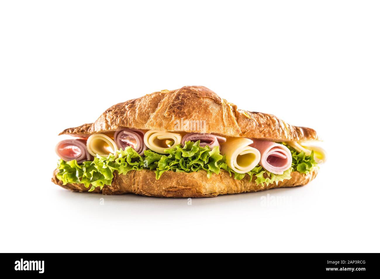 Croissant stuffed with lettuce salad ham and cheese isolated on white background Stock Photo