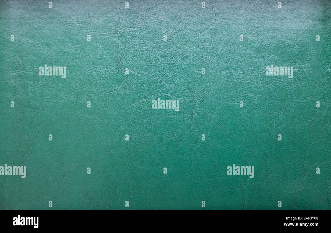 a natural green leather texture. close up. Stock Photo