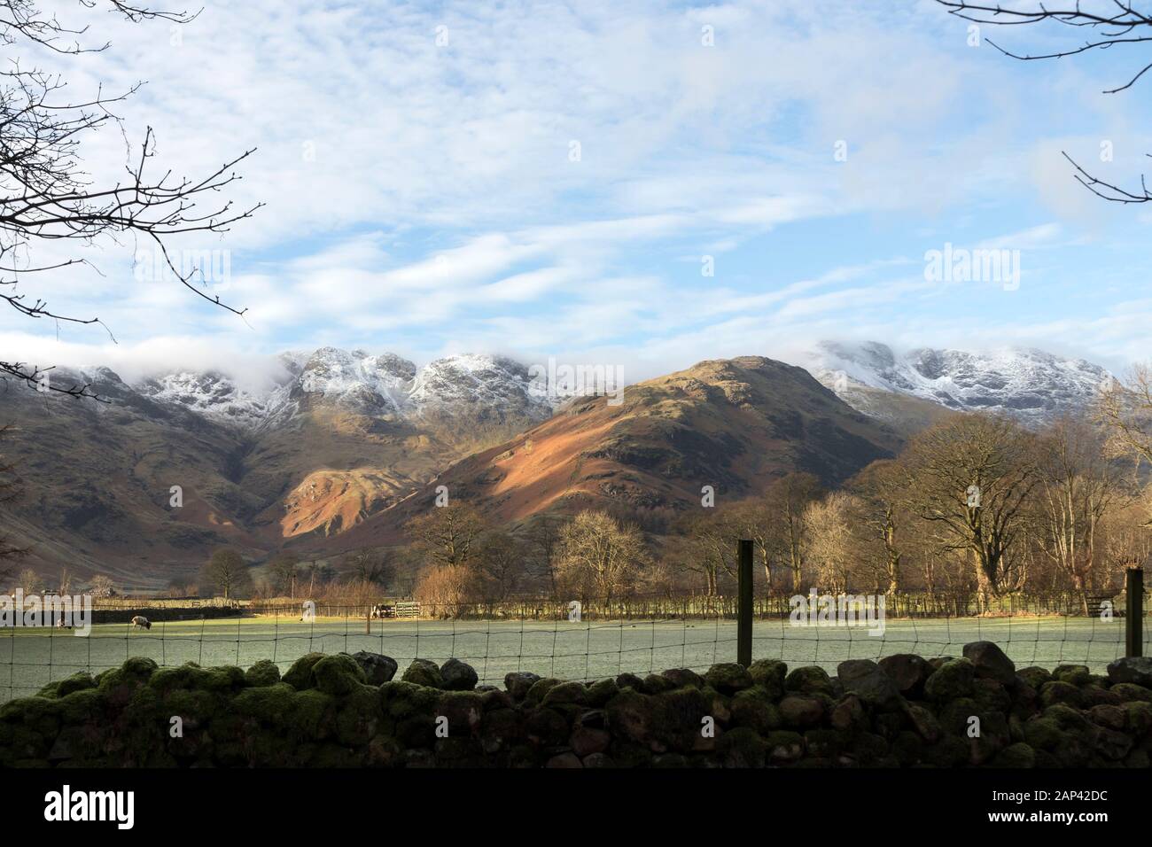 Crinkle Crags and Bowfell Viewed from Langdale in Winter, Lake District, Cumbria, UK Stock Photo