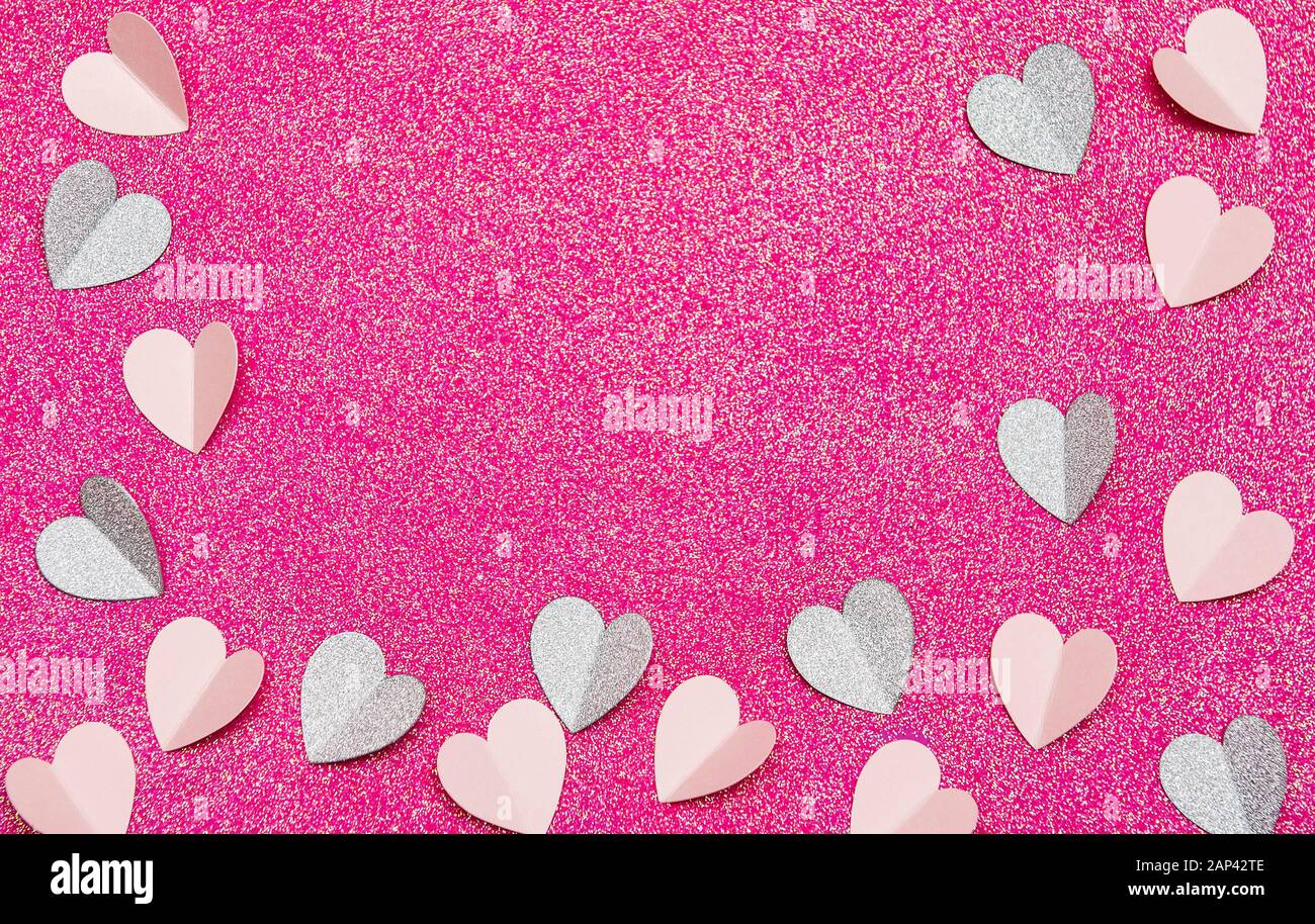 Hearts made of paper on a pink background, top view. Pink background ...