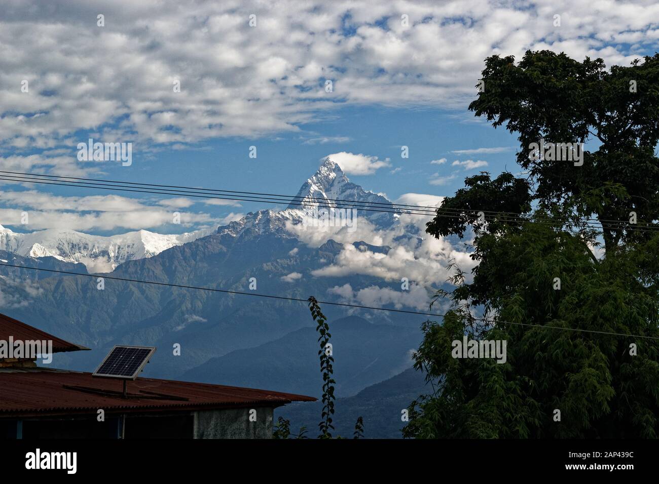 The peak of the fishtail mountain as seen from a lodge in Pubmdi Bumdi village Stock Photo