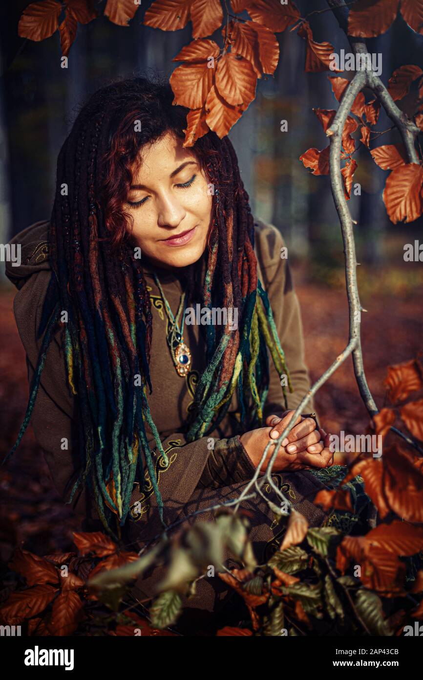 beautiful girl with radiant red hair in sommer dress in a meditative spiritual gesture of prayer Stock Photo - Alamy beautiful girl with radiant red hair in sommer dress in a meditative spiritual gesture of prayer Stock Photo - Alamy