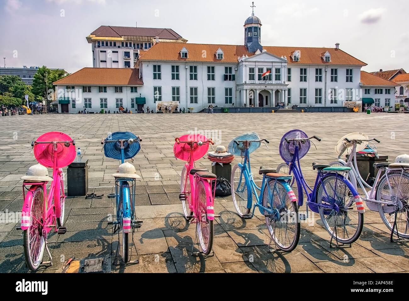 Colorful bicycles in touristic area in Jakarta square Stock Photo