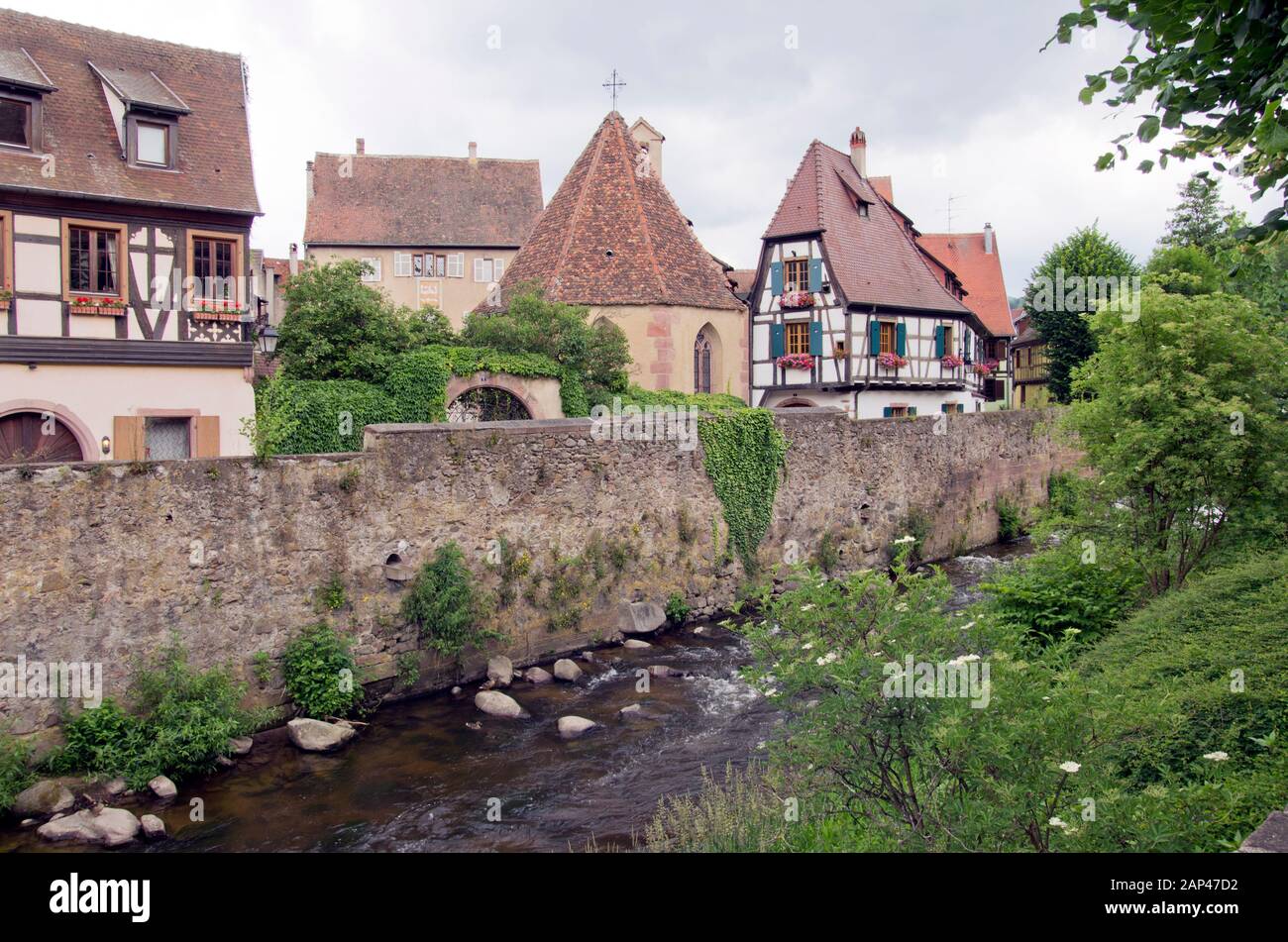 Riverside buildings in Kaysersberg-Vignoble Alsace Stock Photo