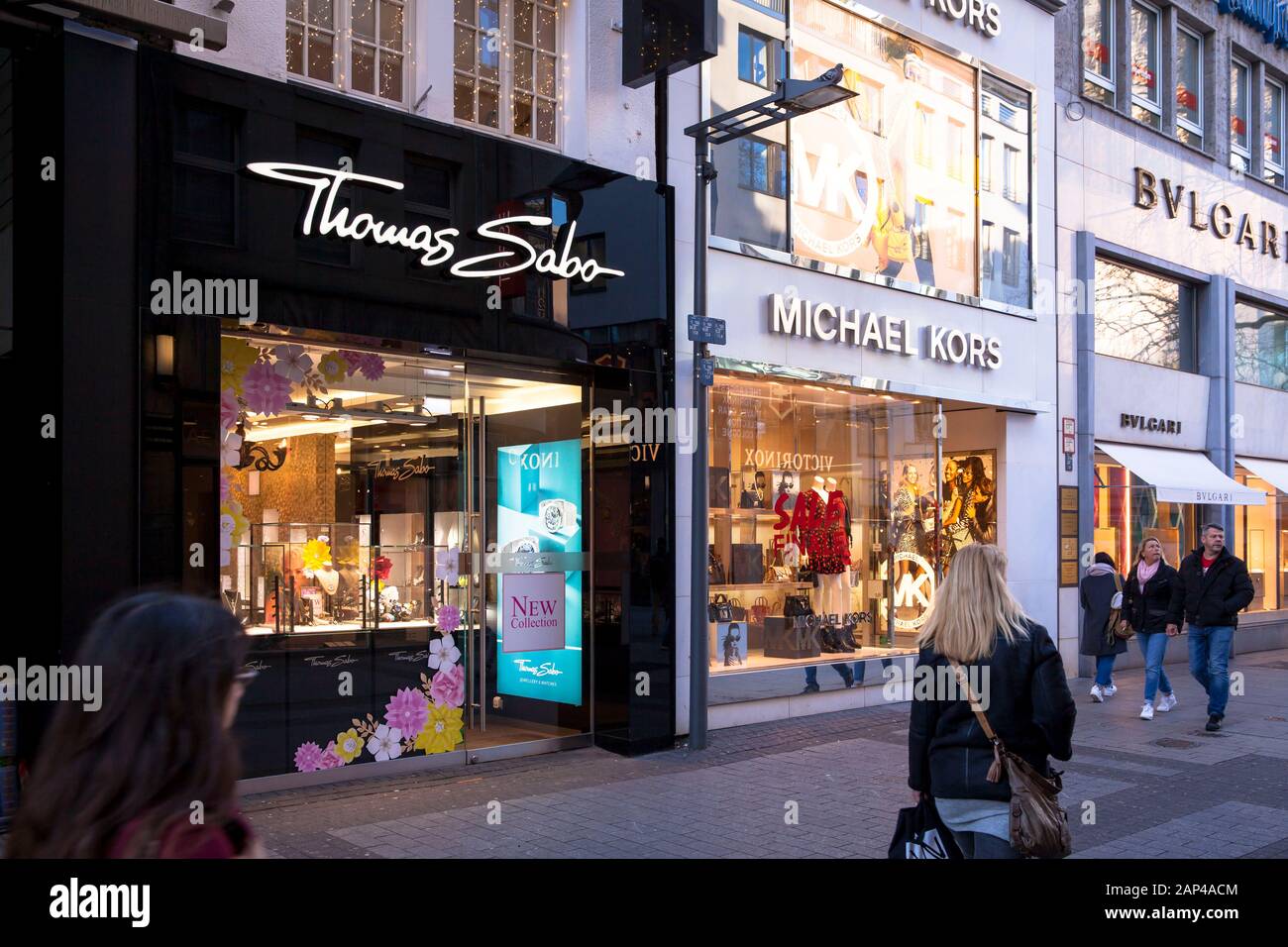 Europe, Germany, Cologne, Thomas Sabo and Michael Kors stores on the shopping street Hohe Strasse.  Europa, Deutschland, Koeln, Thomas Sabo und Michae Stock Photo