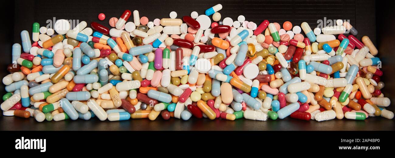 File Header Medication Panorama header with colorful medication in a dark box Stock Photo - Alamy