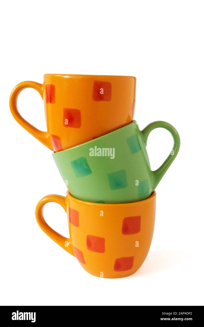 Stack of colorful coffee cups isolated on white background Stock Photo