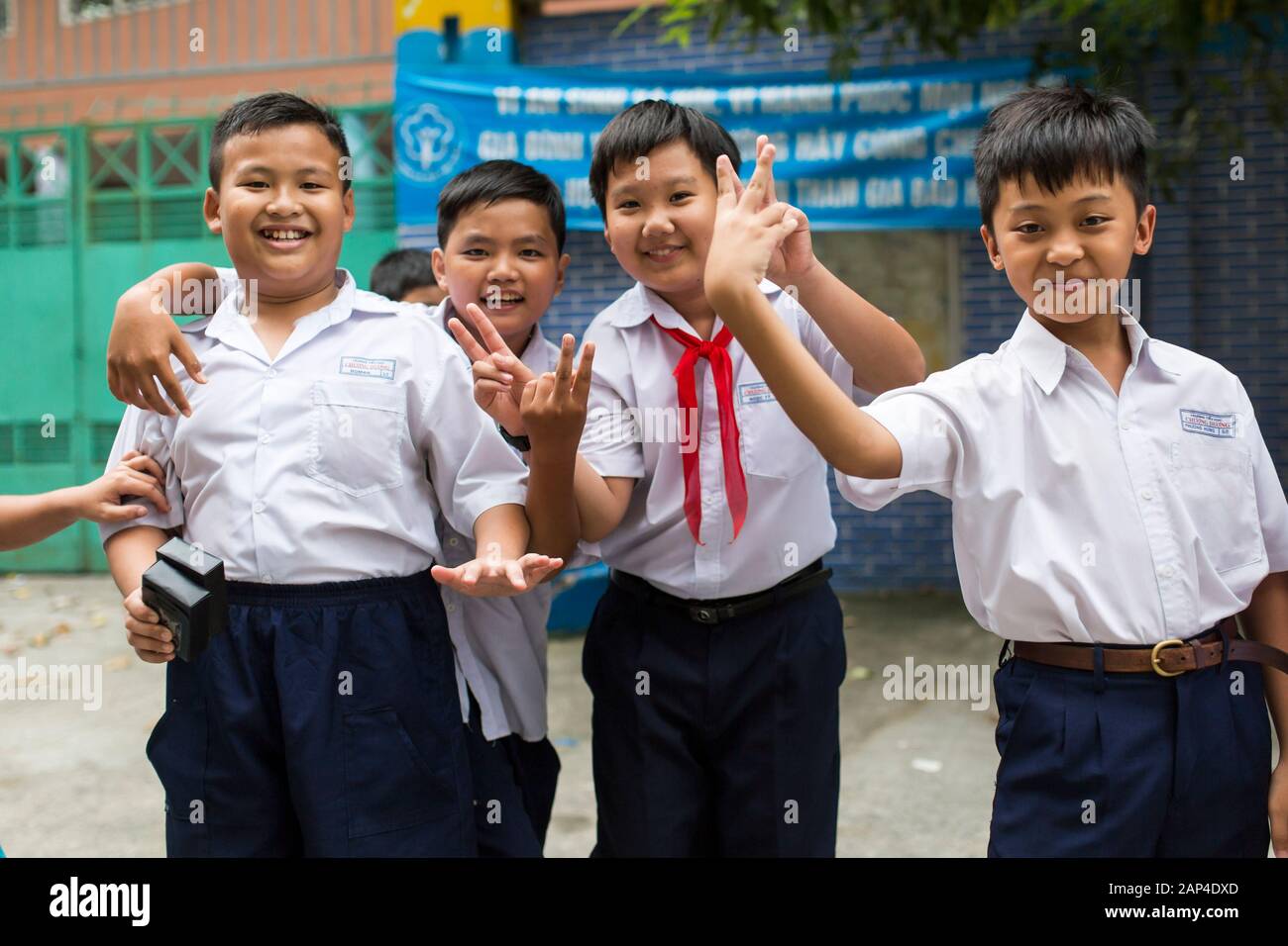 Group of boys in school uniform playing hires stock photography and