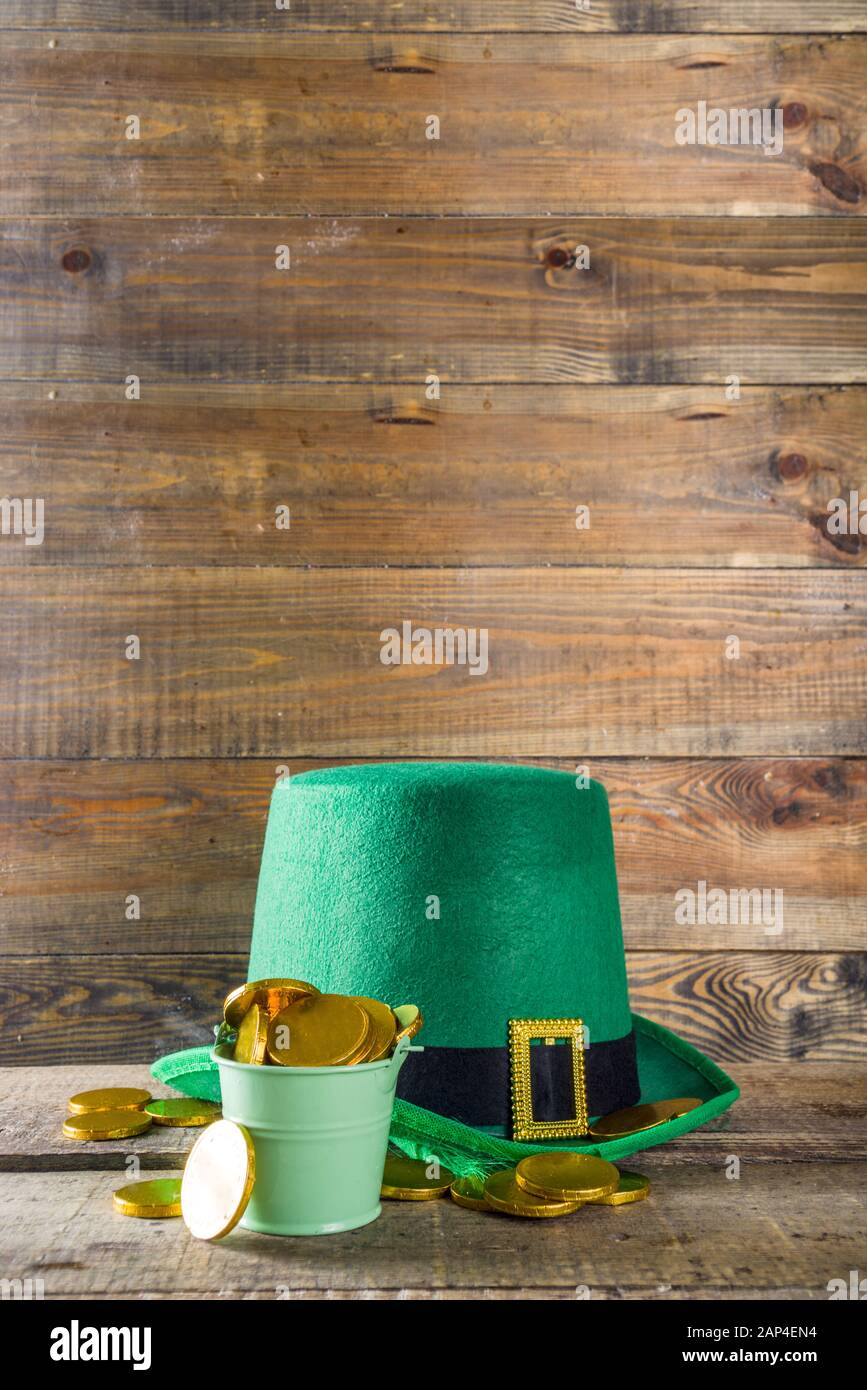 Food For Kids Celebrating St Patrick Day Party Green Leprechaun Hat With Green Sweets Sweets Drink Rainbow Cupcakes And Golden Chocolate Coins Stock Photo Alamy
