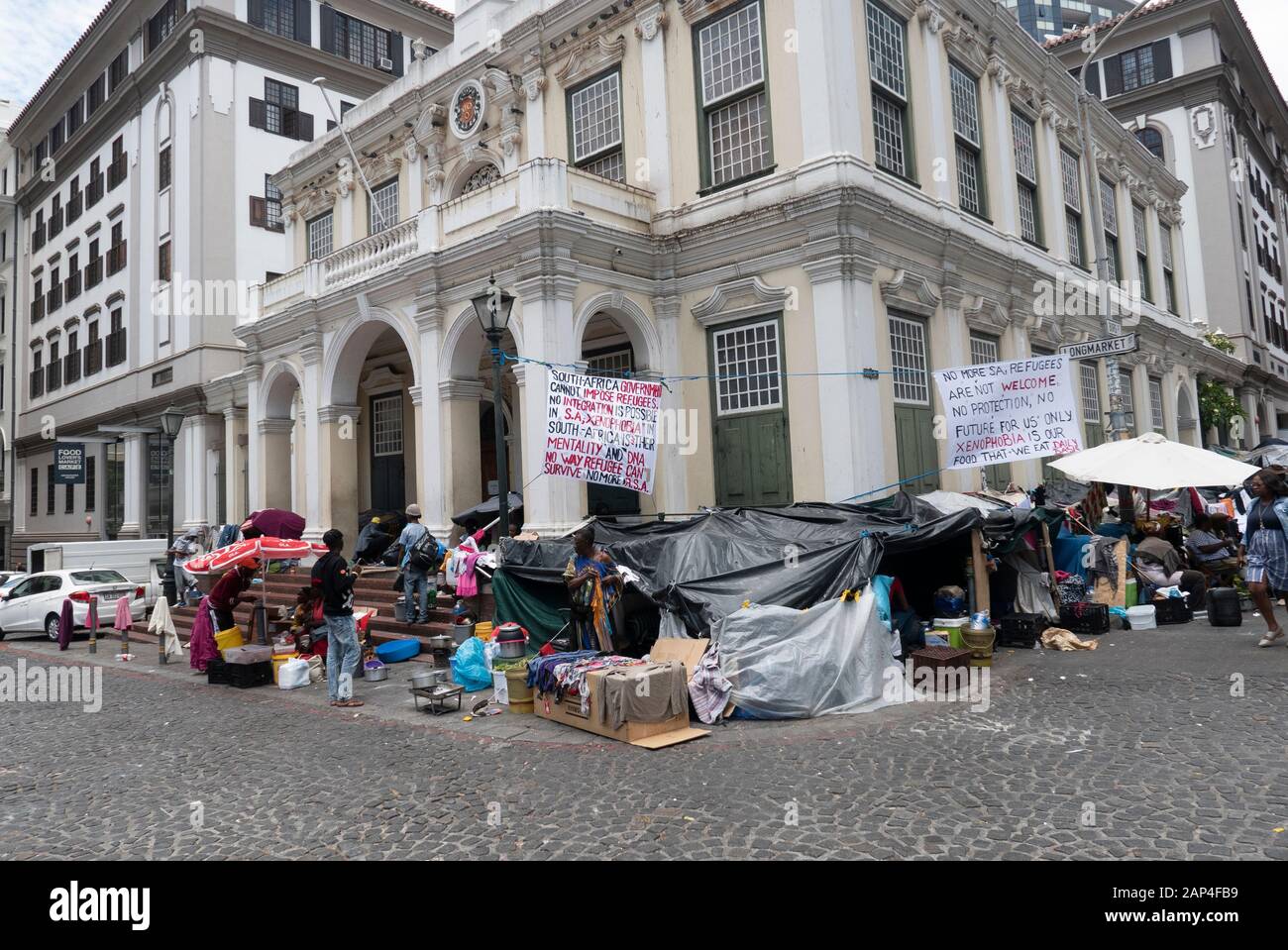 Refugees from all over Africa, seek sanctuary in church square in centre of Cape Town.They feel endangered by the local hostile attitude to themselves. Stock Photo
