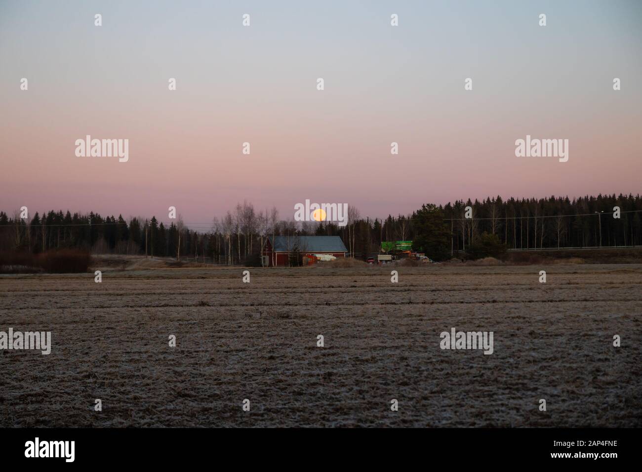 Rural landscape with old house and full moon Stock Photo - Alamy