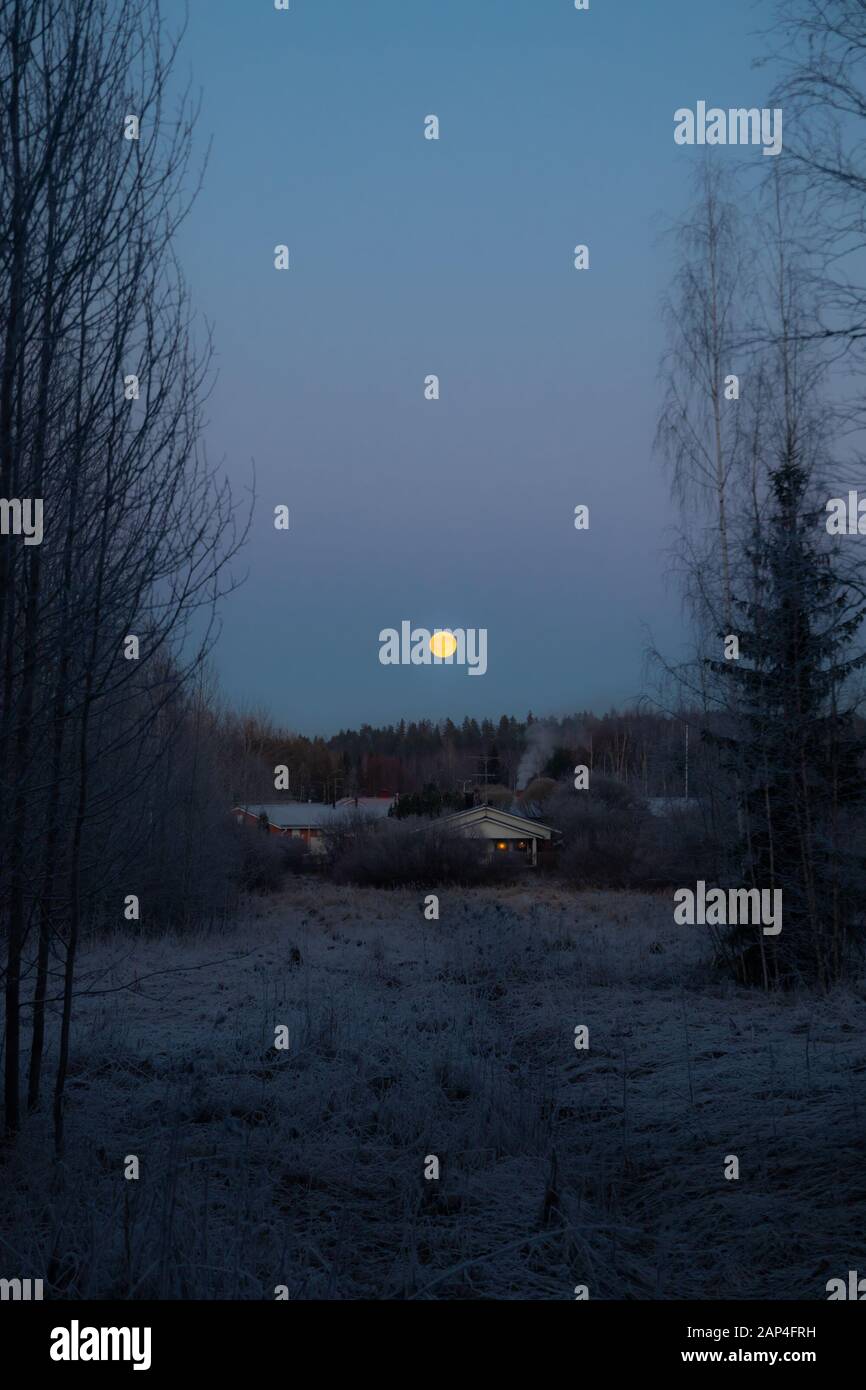 Rural landscape with old house and full moon Stock Photo - Alamy