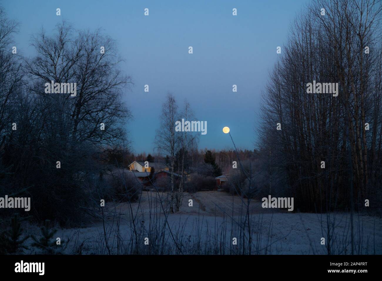 Rural landscape with old house and full moon Stock Photo - Alamy