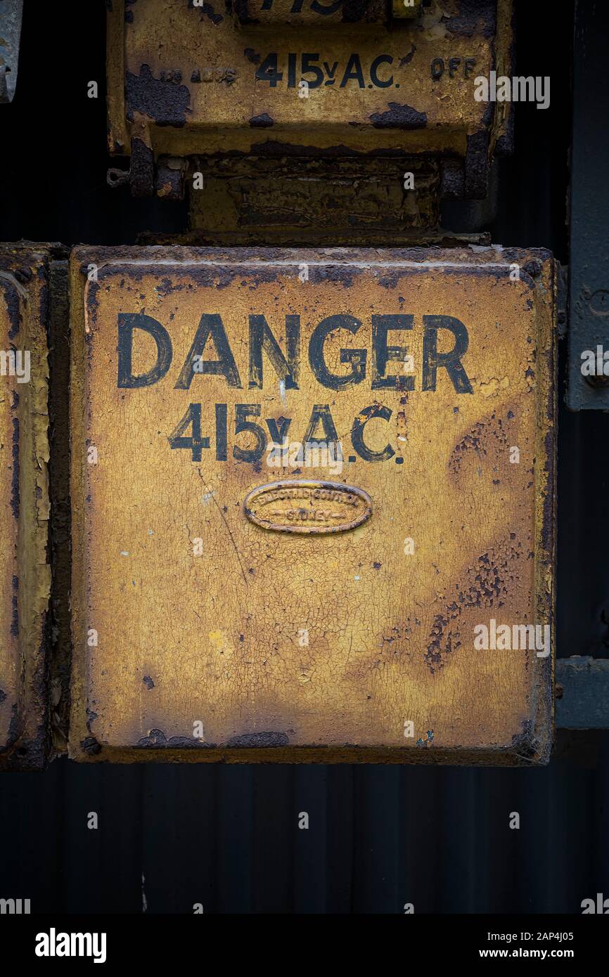 Danger high voltage at abandoned industrial area Stock Photo