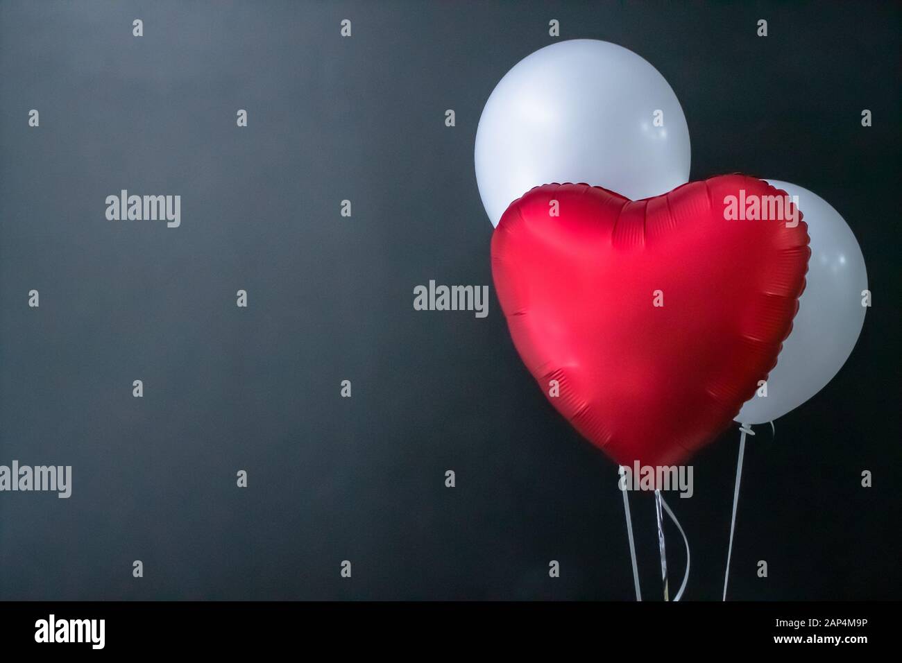 Colourful balloons, pink, white, streamers. Helium Ballon floating in  birthday party. Concept balloon of love and valentine Stock Photo - Alamy