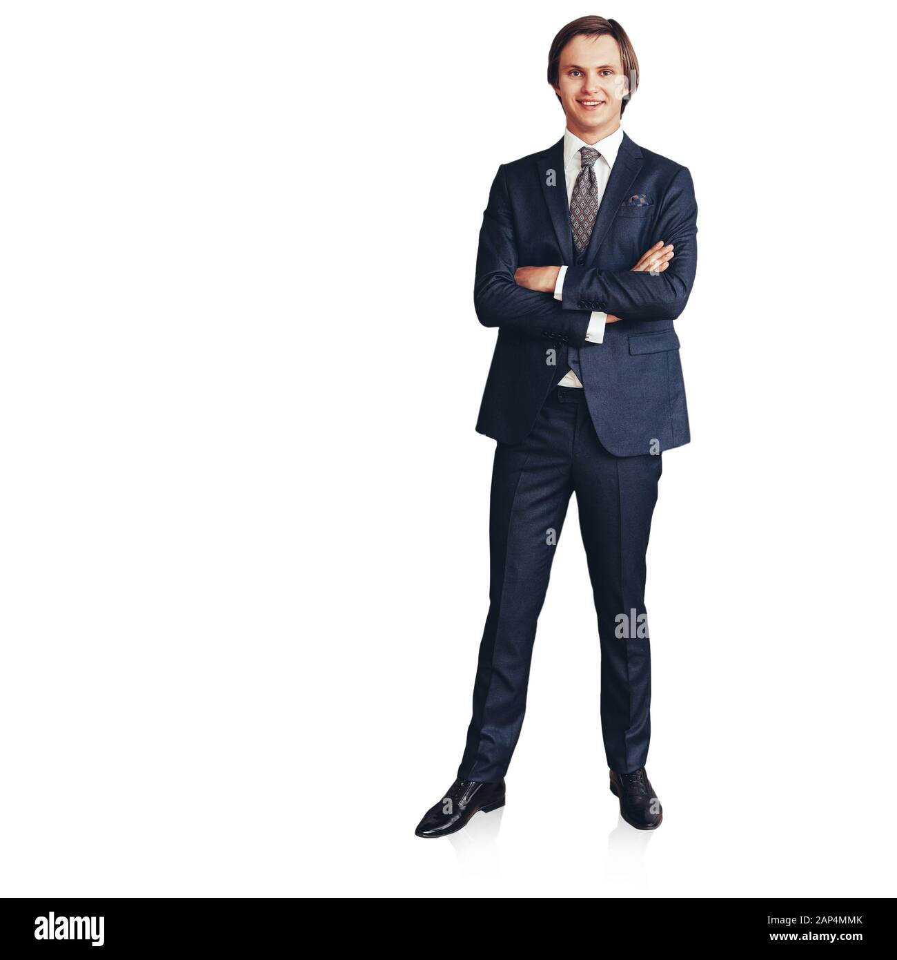 successful young entrepreneur standing in his office. isolated on a white background Stock Photo