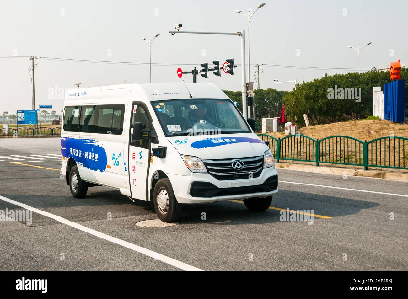 A self-driving Maxus EV80 that uses LIDAR undergoing testing at the autonomous vehicle testing ground in Lingang, Shanghai, which is especially design Stock Photo