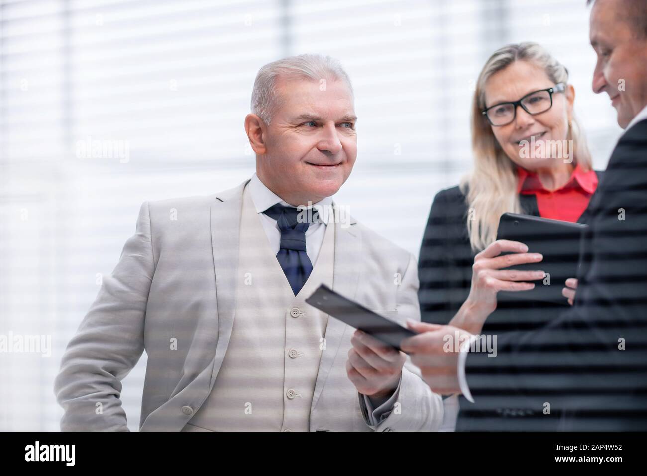 close up. project Manager discussing with employees working documents ...