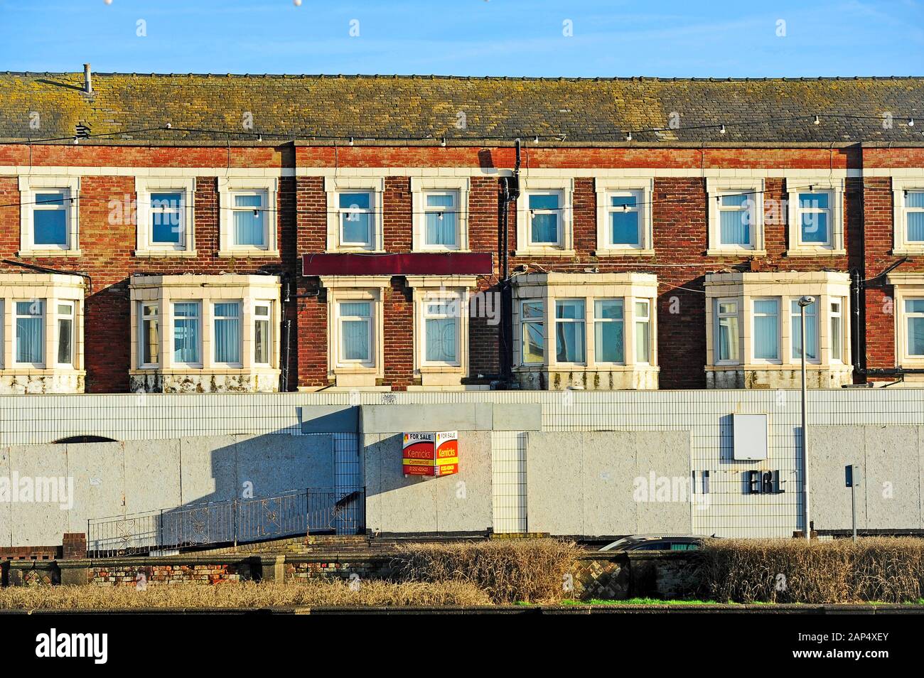 Boarded up and empty seafront hotel for sale,Blackpool,UK Stock Photo