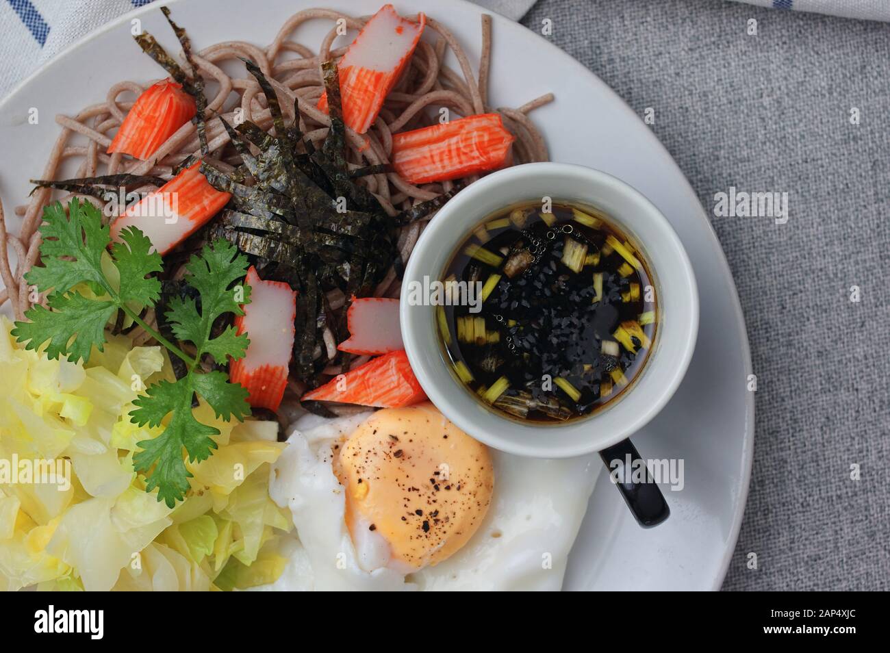 Buckwheat noodle served with dipping sauce Stock Photo Alamy